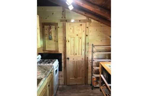 Northome Cabin | Authentic Log Cabin Island Lake Pet Friendly Northshore Bay Resort