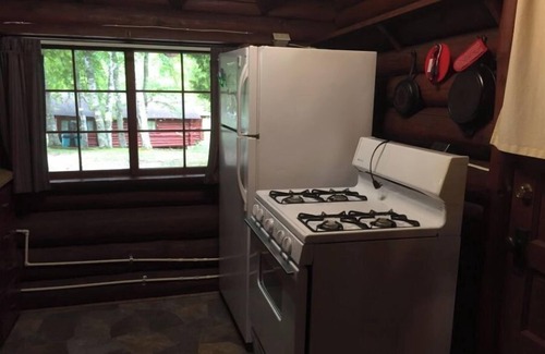 Northome Cabin | Authentic Log Cabin Pet Friendly Island Lake Northshore Bay Resort