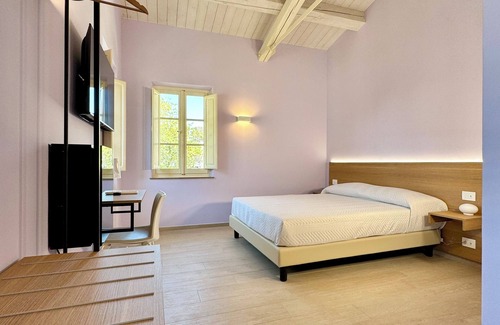 Falerone Bed & Breakfast | B&B Casa Castelli-Elegant Art Nouveau villa with garden in front of Roman theater