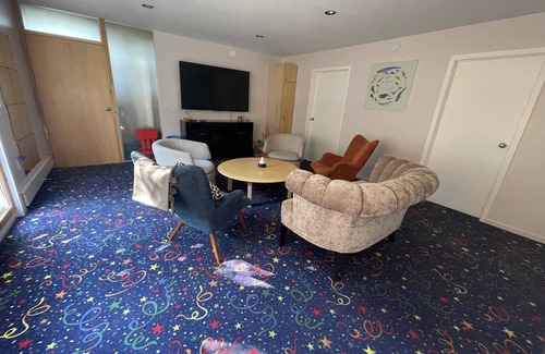 Yellowknife House | B&B with 2 rooms, guests washroom, private media room, shared living & kitchen.
