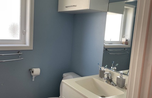 Yellowknife House | B&B with 2 rooms, guests washroom, private media room, shared living & kitchen.