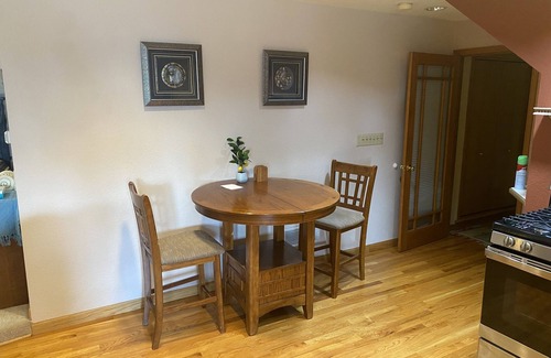 Lamar Heights Area Apartment | B. Spacious one-bedroom apartment in lower level with large windows