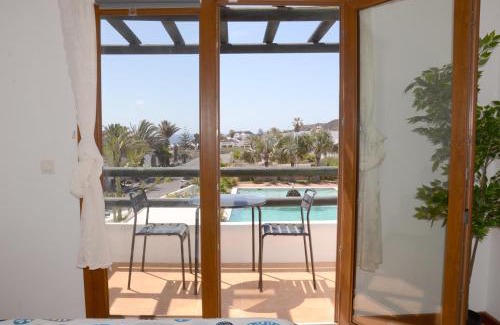 Charco del Palo Apartment | B16-Dúplex luminoso+ piscina a 150 m del mar