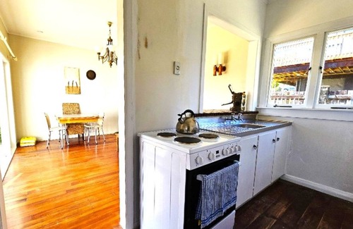Rawene House | Bach with beautiful harbour views in historic Rawene village.