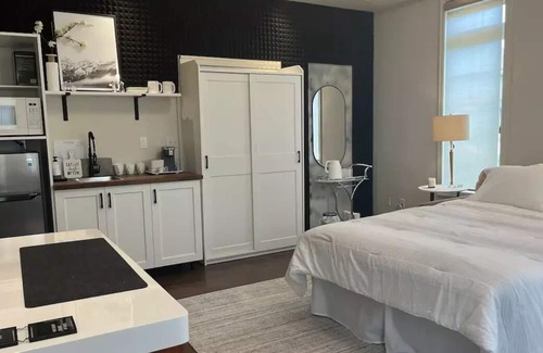 Doon South House | Bachelor suite with private entrance