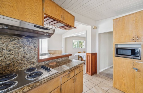 Balboa Peninsula Apartment | Backyard Beach! 50 Steps to the Sand with Bay Views and Ocean Blues