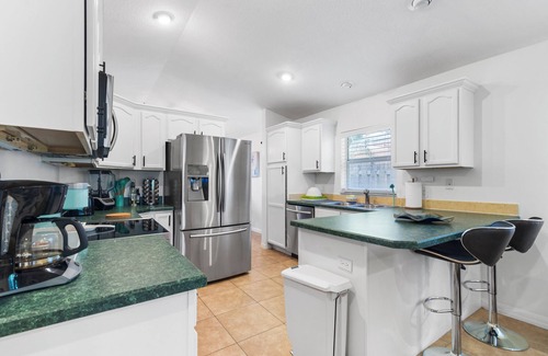 Jupiter House | Backyard retreat with BBQ Patio & game room