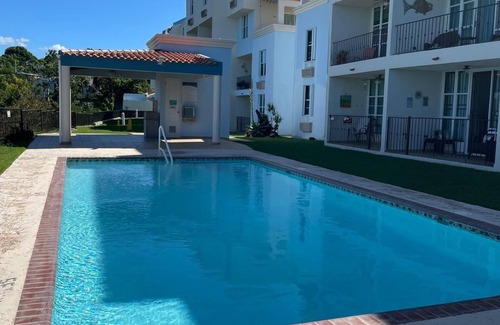 La Mela Condo | Bahia Real apartment located front of the pool