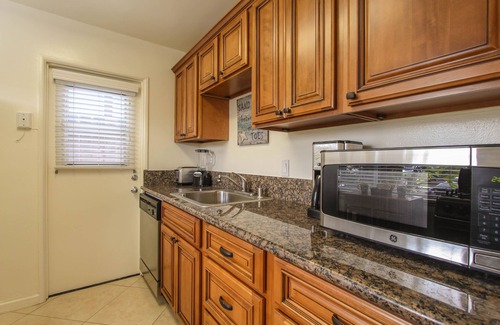 Balboa Peninsula Apartment | "Balboa Beach Escape" Steps to Beach and Bay A/C + Garage Parking