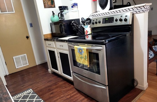 Lawrence House | Bargain Lawrence Stay! Garage+fenced Yard, Near KU, LMH & Downtown