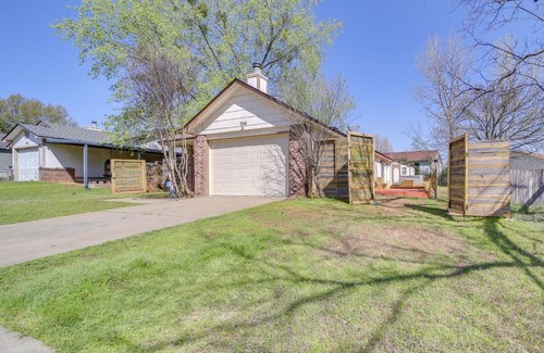 Barling House | Barling Vacation Rental Fenced-In Yard with Hot Tub