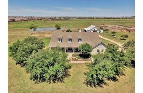 Pflugerville House | Barn Loft Living at a Texas Longhorn Mini Ranch
