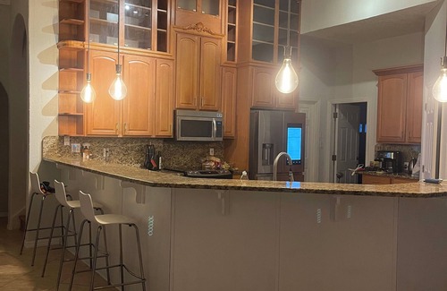 Merritt Island Villa | Barrier island water front luxury villa w dock near beaches and Disney Orlando
