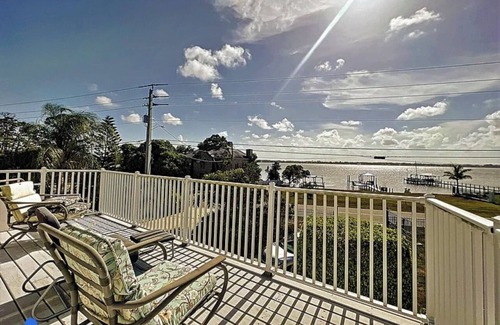 Merritt Island Villa | Barrier island water front luxury villa w dock near beaches and Disney Orlando