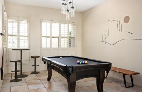 Desert View Village House | Barwick is a private oasis Practice on the putting green shoot pool and enjoy this city getaway.