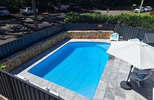 Bateau Bay Hotel | Bay House Motel