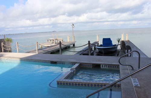 South Padre Island Condo | Bayfront SPI Condo With Boat Slip And Beautiful Sunsets