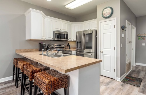Dauphin Island Condo | Bayou Heron #2B: Pet-friendly bayside condo with pool