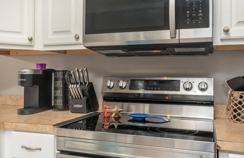 Dauphin Island Condo | Bayou Heron #2B: Pet-friendly bayside condo with pool