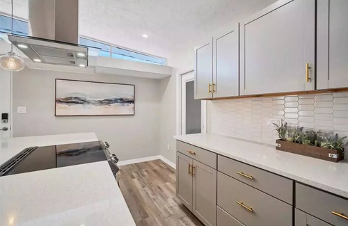 Bayshore Gardens House | Bayshore Gardens remodel with hot tub + fire pit + walk to park and marina