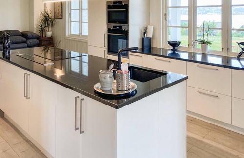 Stord House | Be enchanted by the magnificent view of the fjord in this vacation home.