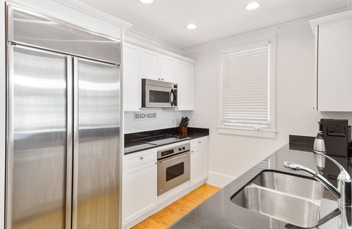 Beach District Condo | Beach days made better under the brim at Beach Hat/Gulf Views/2 Bikes