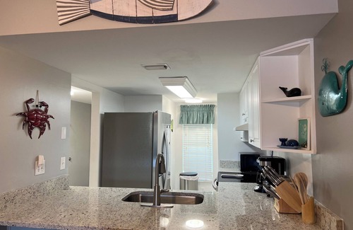 Point East Condo | Beach front condo with ocean views and community pool. 2/2 on non drive beach.