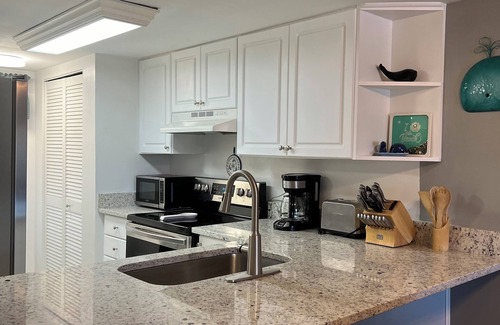 Point East Condo | Beach front condo with ocean views and community pool. 2/2 on non drive beach.
