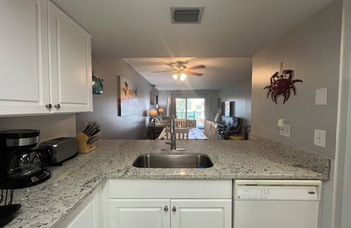 Point East Condo | Beach front condo with ocean views and community pool. 2/2 on non drive beach.