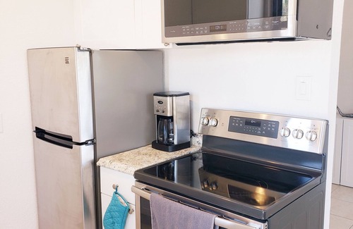 St. Pete Beach Condo | BEACH FRONT CONDO ON THE #1 VOTED BEST BEACH, POOL, VOLLEYBALL!