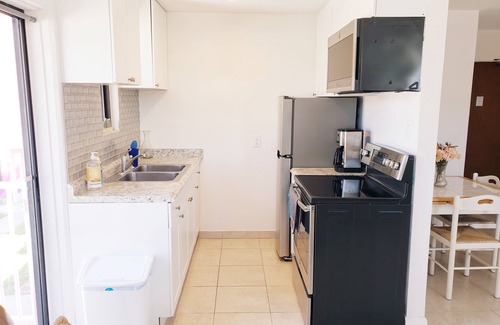 St. Pete Beach Condo | BEACH FRONT CONDO ON THE #1 VOTED BEST BEACH, POOL, VOLLEYBALL!