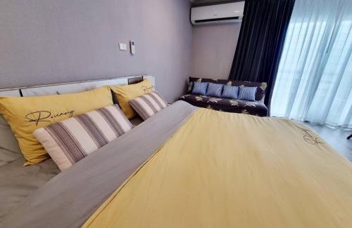 Rayong Apartment | BEACH FRONT modern room + Free hi speed Wi-Fi