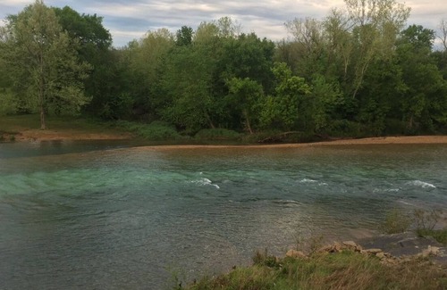 Pineville Cabin | Beach house-style cabin on the Elk River in Pineville, Missouri