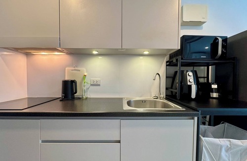 Kram Condo | Beach living 1 bdrm well equiped kitchen, AC, Wi-Fi and Living room