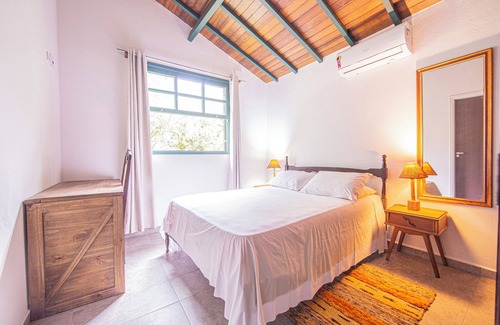 Camburi House | Beach + stream house with natural pool