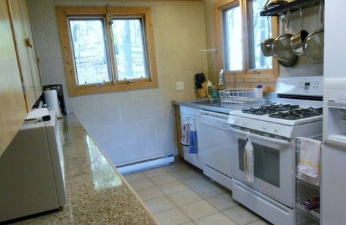 Onekama House | Beaches & View on Lake Michigan and Portage Lake. Secluded home & private dock