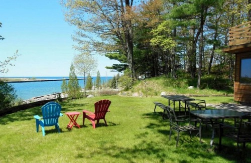 Onekama House | Beaches & View on Lake Michigan and Portage Lake. Secluded home & private dock