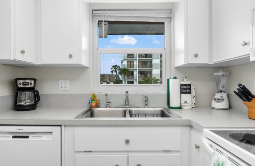 Avon By The Sea Condo | Beachfront 2BR Condo W/Pool BBQ & Steps To Beach Close to Space Center and Dini