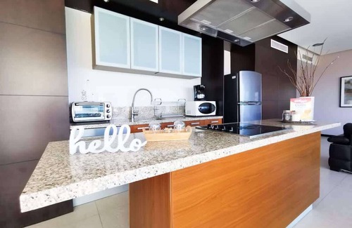 North Hotel Zone Condo | Beachfront Bliss, Gorgeous Pools in Peninsula bldg