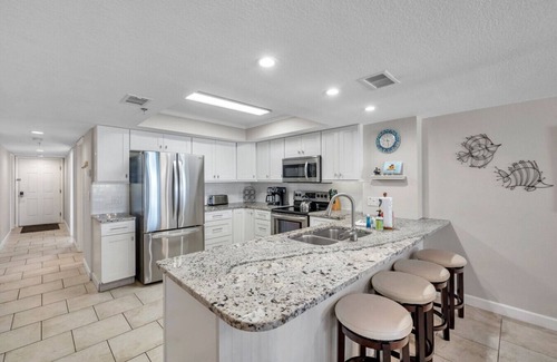 Indian Shores Condo | Beachfront End Unit 3-Bedroom with Wrap-Around Balcony