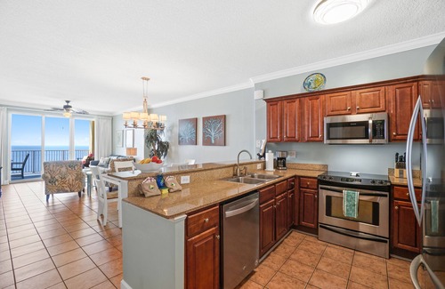 West Panama City Beach Condo | BEACHFRONT Panoramic Corner Unit, Beach Service, Wifi, free parking, Sleeps 6!