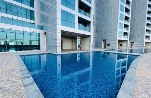 Rumailah Apartment | Beachfront paradise just minutes from Dubai