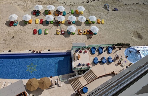 Punta Cancun Condo | Beachfront resort in best location, walk to best clubs and restaurants