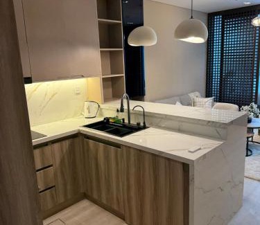 Beach & Coast Apartment | Beachfront studio holiday home