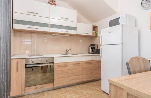 Trogir Villa | Beachfront villa Mihovil with direct beach access, garden, pool and mooring