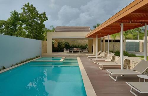 Juan Dolio - El Pueblo Apartment | Beachside 1Bdrm Apt. Hidden Oasis with Pool & BBQ