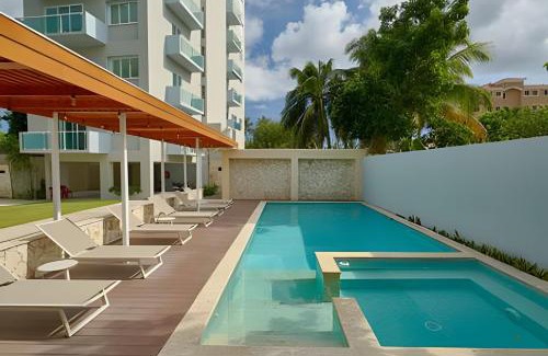 Juan Dolio - El Pueblo Apartment | Beachside 1Bdrm Apt. Hidden Oasis with Pool & BBQ
