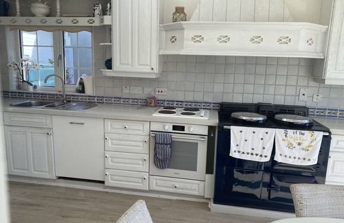 Beadnell House | Beadnell Fantastic Bungalow - garden backs straight onto dunes and beach.