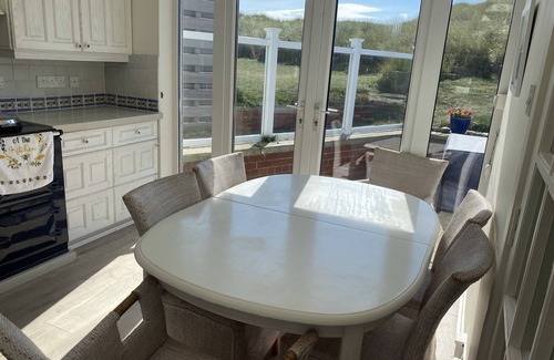 Beadnell House | Beadnell Fantastic Bungalow - garden backs straight onto dunes and beach.