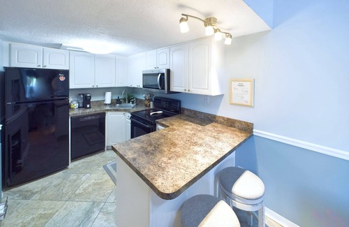 Cape Caneveral Beach Gardens Condo | Beautiful 2 Bedroom, 2 Bathroom Condo in Royal Mansions With Launch & Ocean Views!